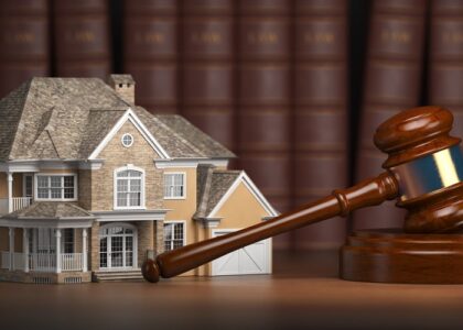 House with gavel and law books.