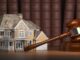 House with gavel and law books.